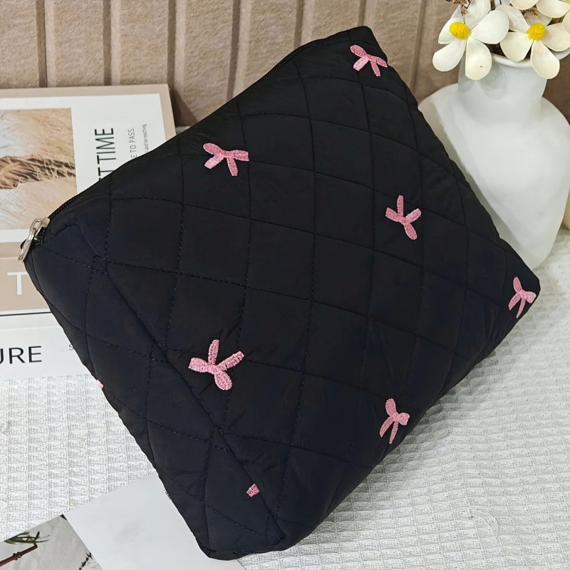 Kosmetyczka damska pikowana czarna w kokardki 23 x 7 x 16 cm KS156 - obrazek 2